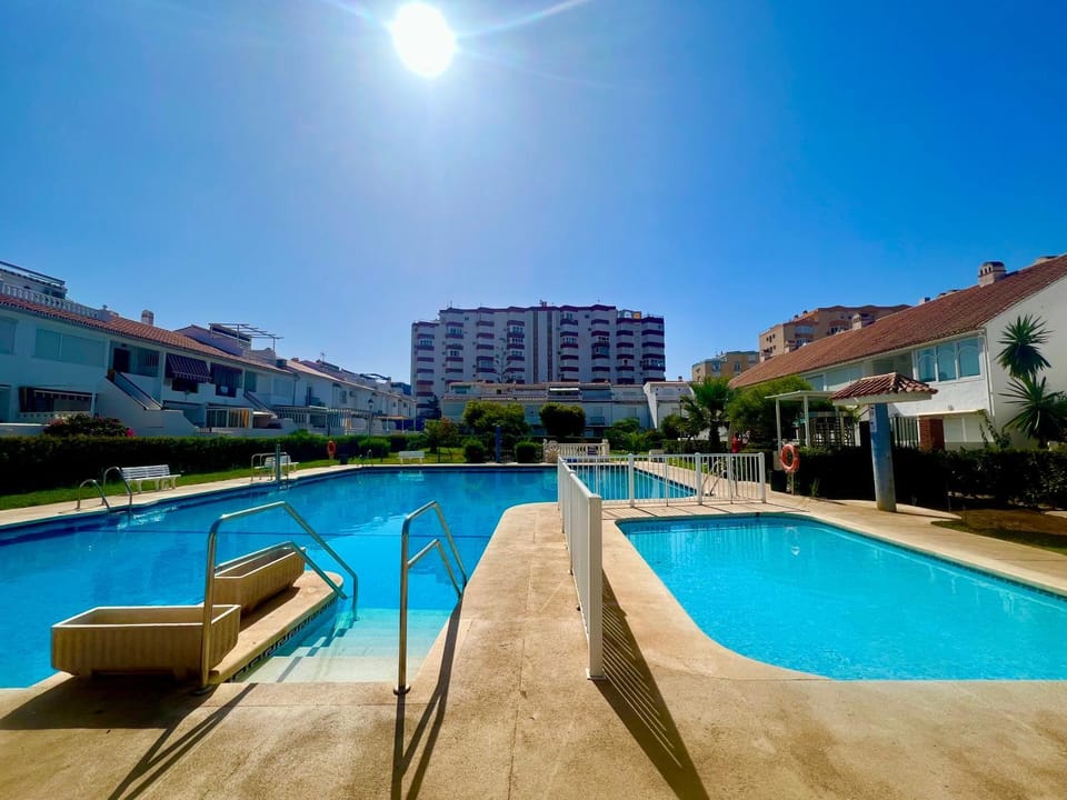 Property building, Day, Pool view, Swimming pool, sunbed