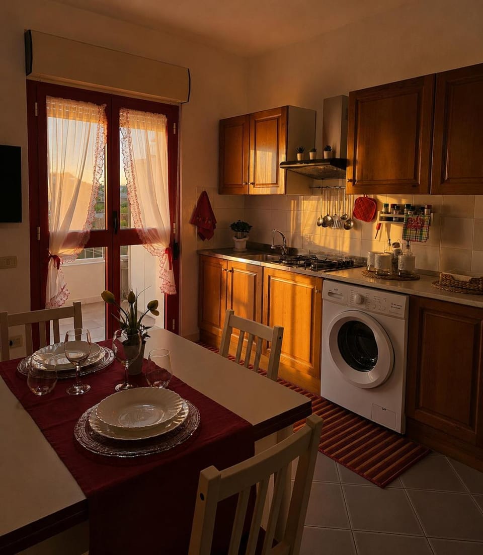 Kitchen or kitchenette, Dining area, stove, washing machine