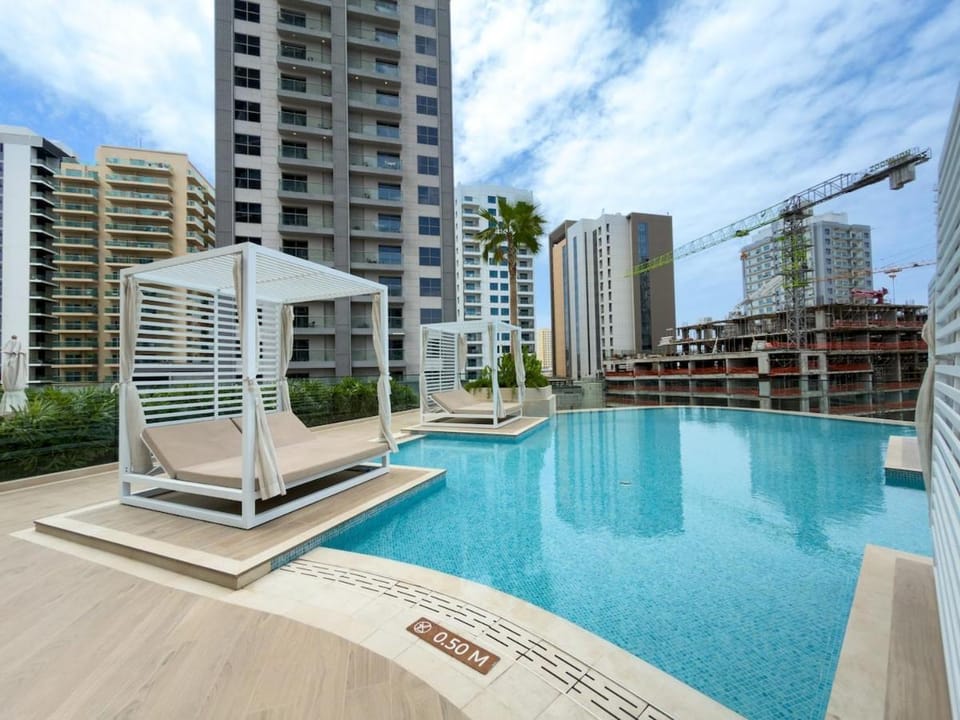 Swimming pool, sunbed