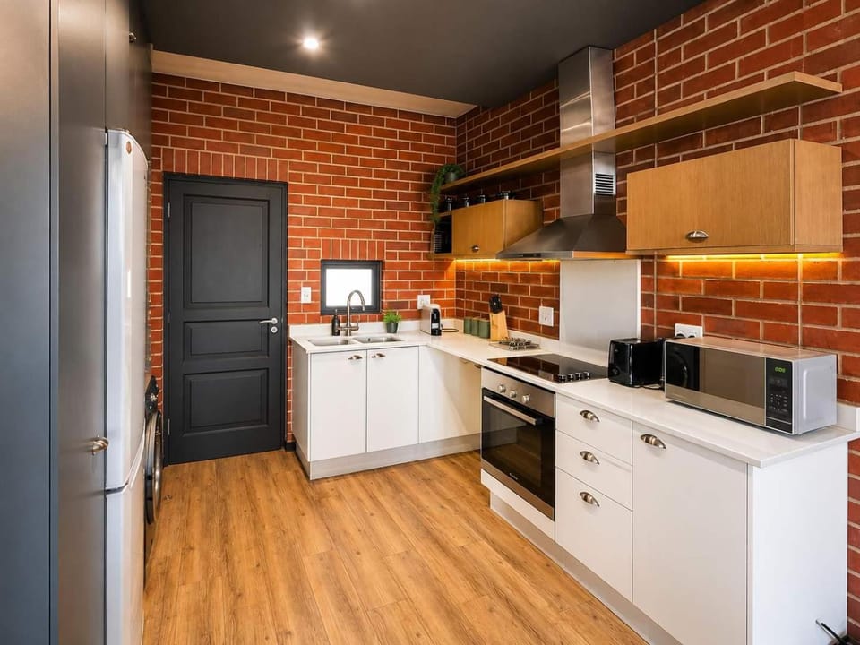 Kitchen or kitchenette, oven, stove, toaster