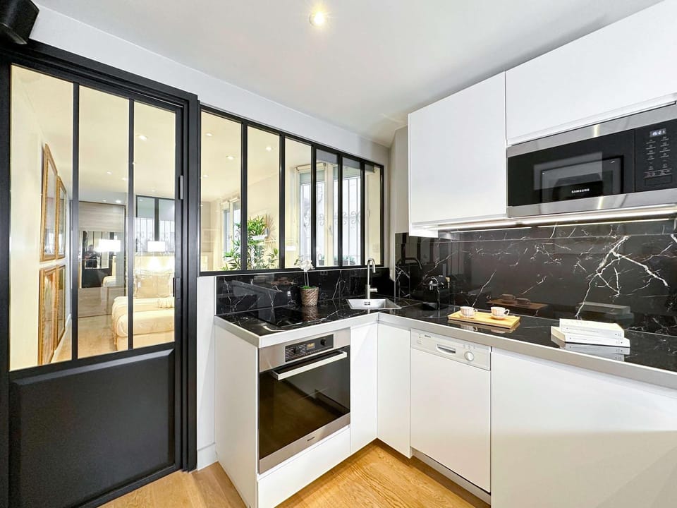 Kitchen or kitchenette, dishwasher, stove, toaster