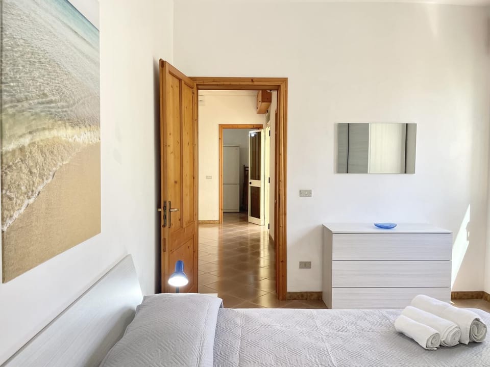 Bed, Living room, Seating area, Bedroom, towels, wardrobe