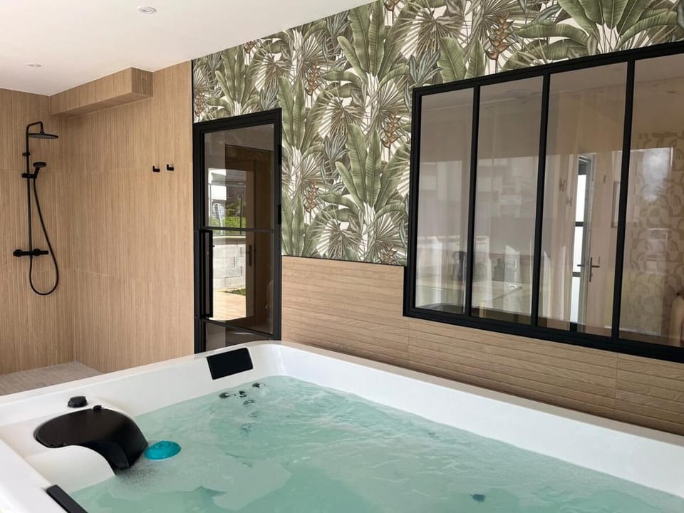 Appartement Nympha - Jacuzzi Privatif - Luxe & Intimité Apartment in Brittany