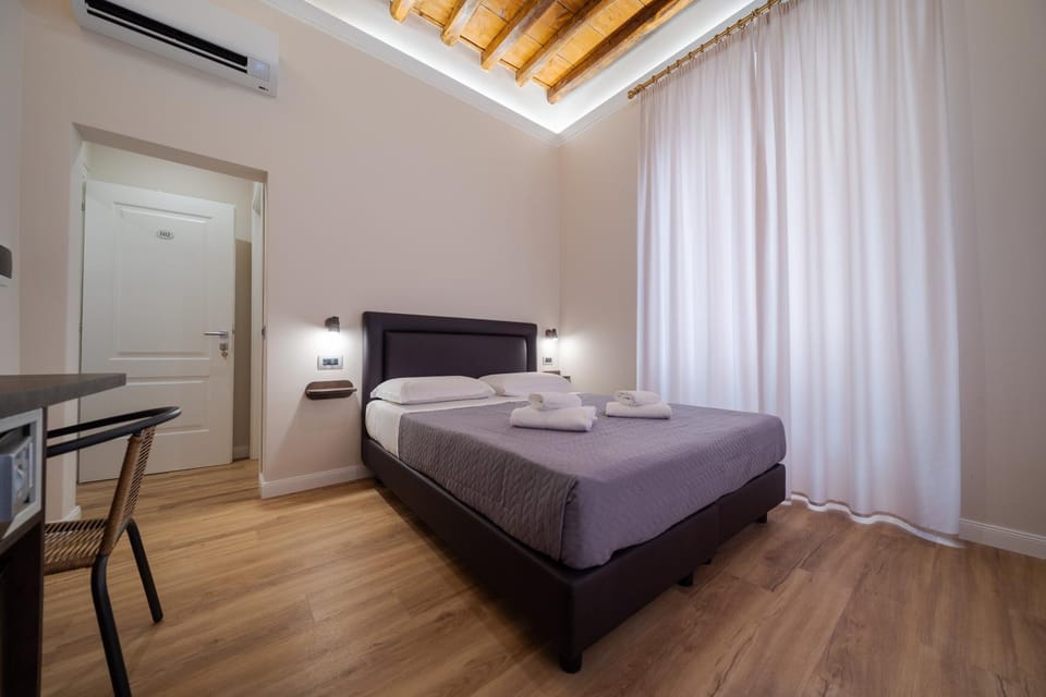 Bed, Photo of the whole room, Bedroom, towels, air conditioner