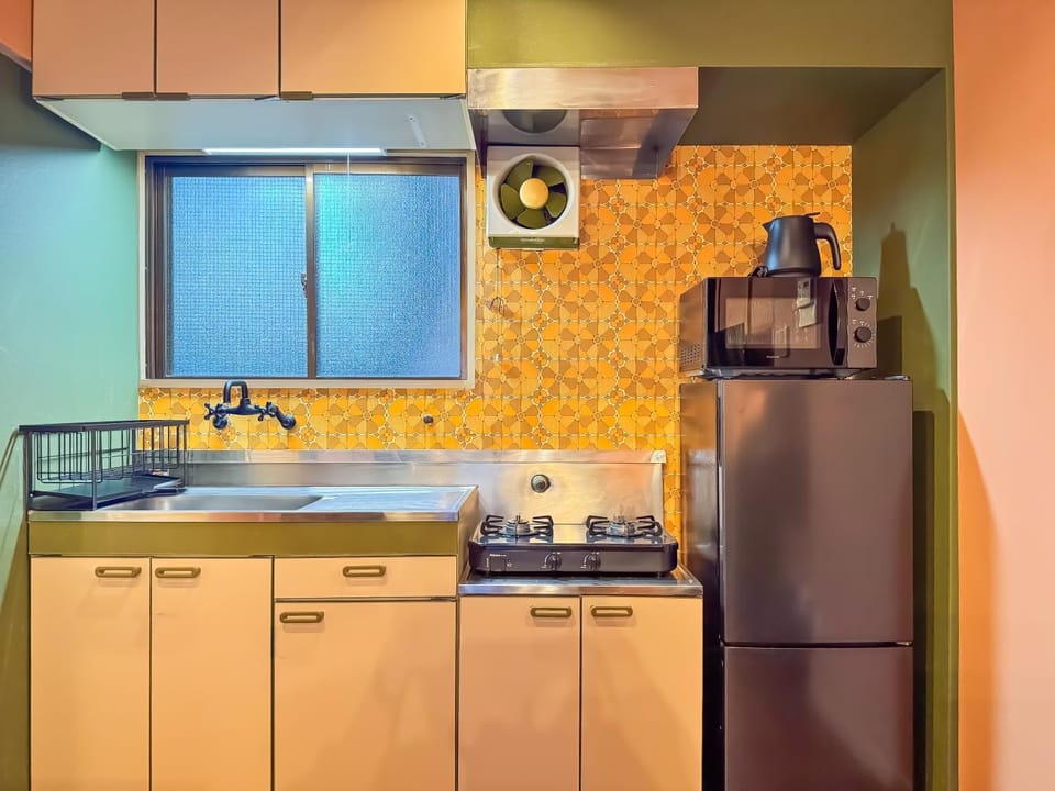 Kitchen or kitchenette, microwave, stove, kitchen