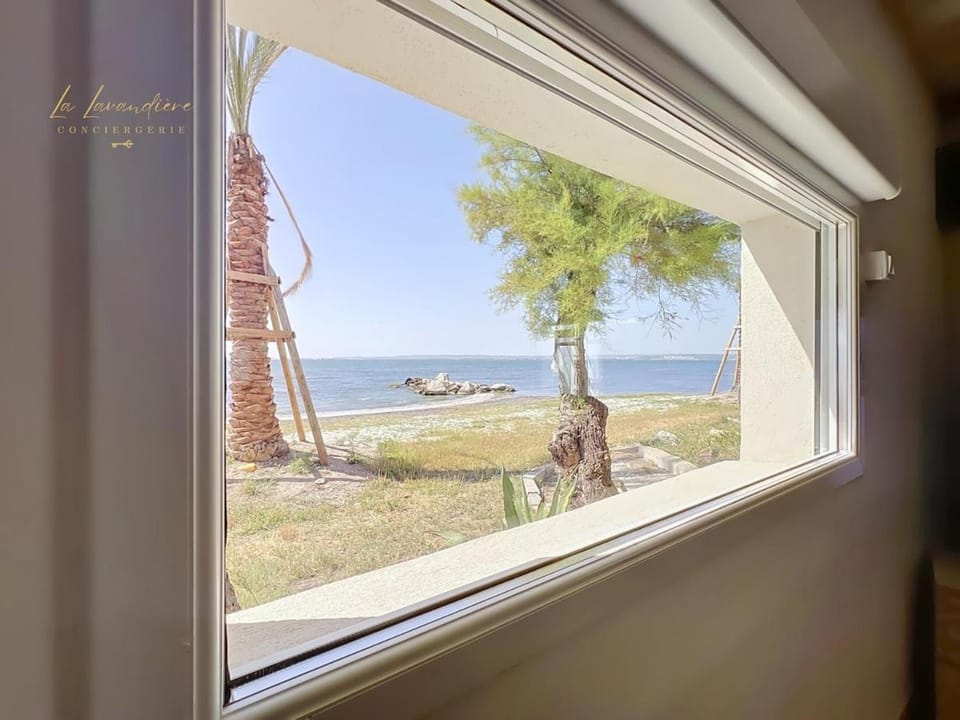 La Détente - Les Pieds dans l'eau, 3 chambres, 6 personnes, Jardin, Plage Apartment in Marignane