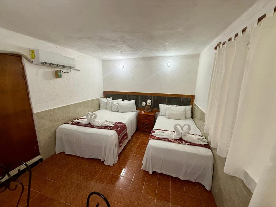 Bed, Photo of the whole room, towels, air conditioner