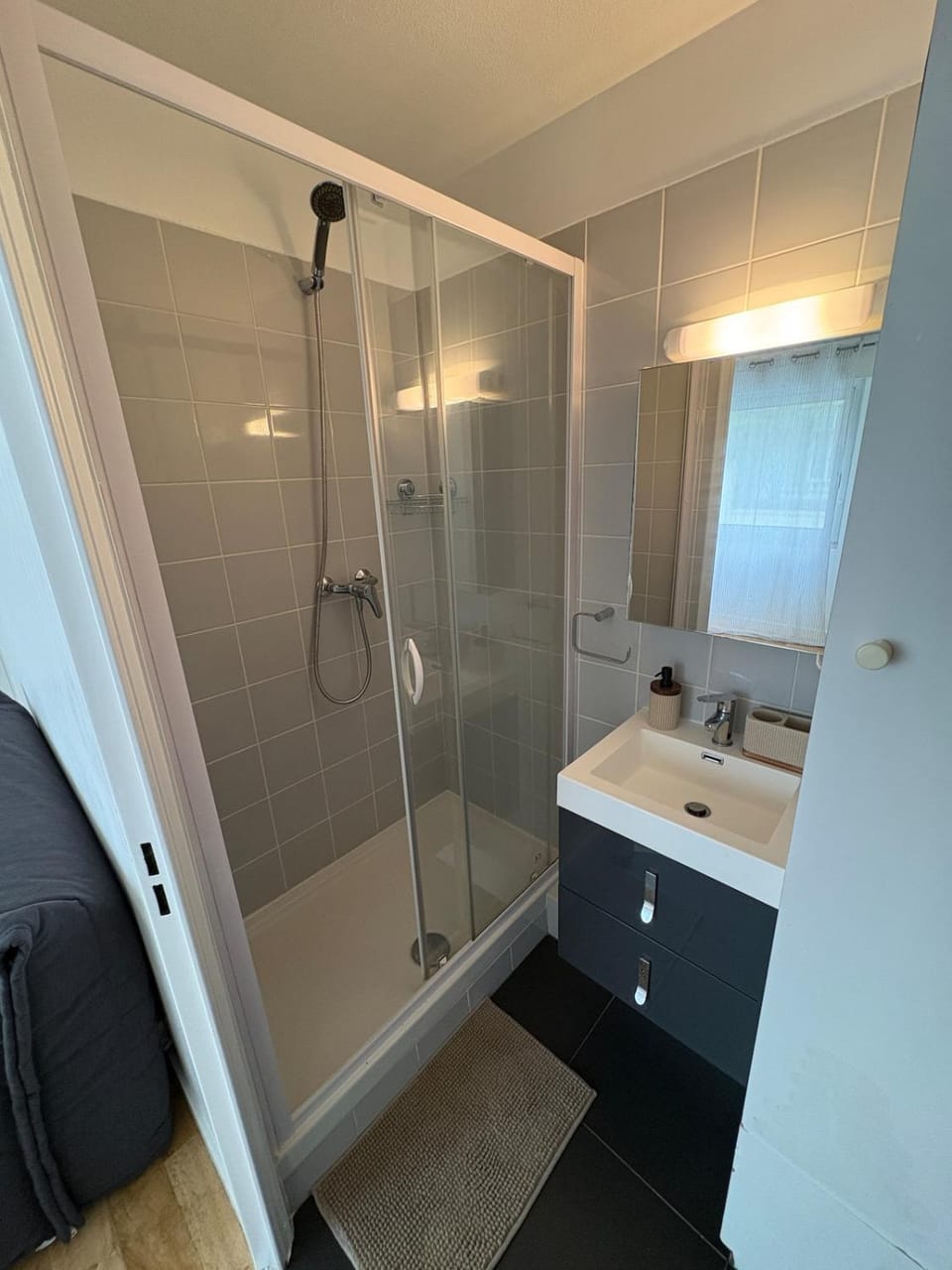 Shower, Bathroom, hair dryier, towels