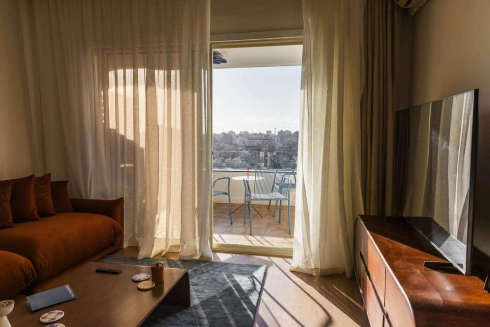 The Ever Flowing /Zamalek Nile Loft Apartment in Cairo
