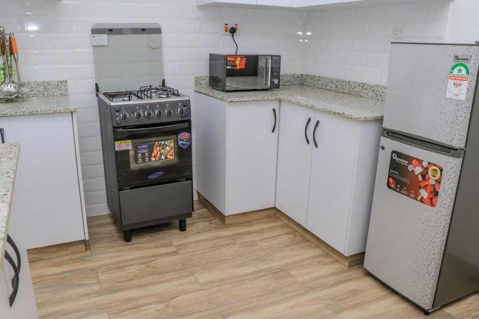 Kitchen or kitchenette, oven, stove