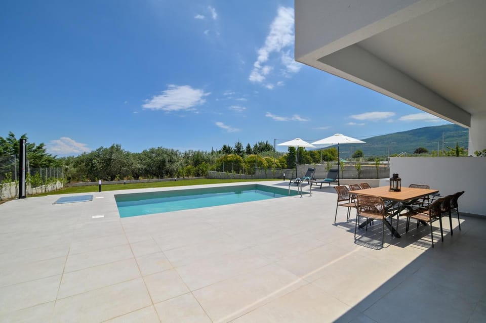 Patio, Day, Pool view, Swimming pool, sunbed