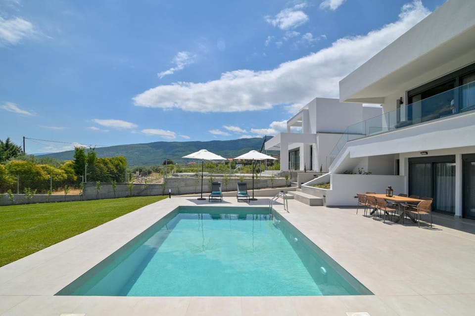 Property building, Day, Natural landscape, Pool view, Swimming pool, sunbed