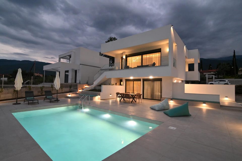 Property building, Night, Natural landscape, Pool view, Swimming pool, sunbed