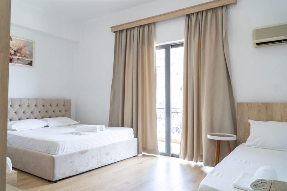 Bed, TV and multimedia, Bedroom, towels, air conditioner