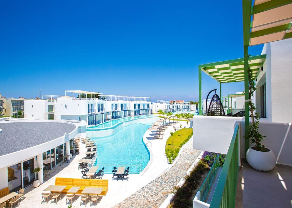 Property building, Patio, Day, View (from property/room), Balcony/Terrace, Pool view, Swimming pool, sunbed
