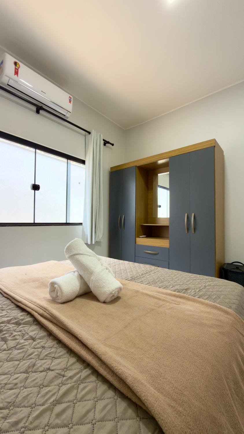 Bedroom, towels, wardrobe, air conditioner