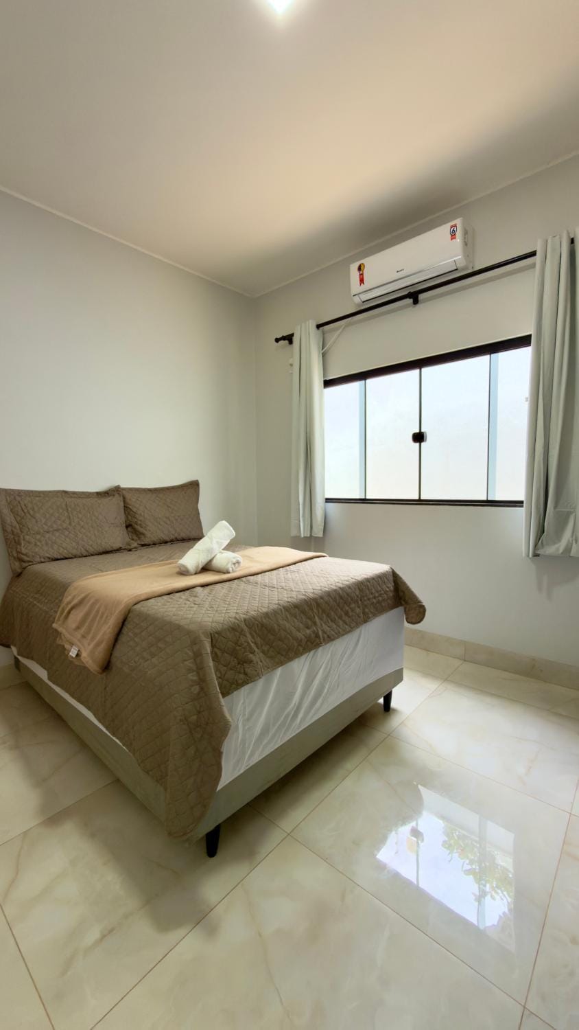 Bed, towels, air conditioner