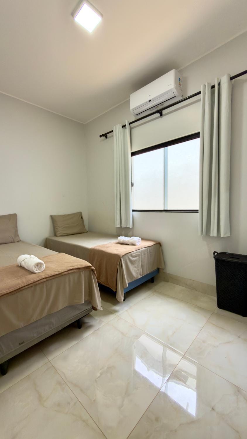Bed, towels, air conditioner