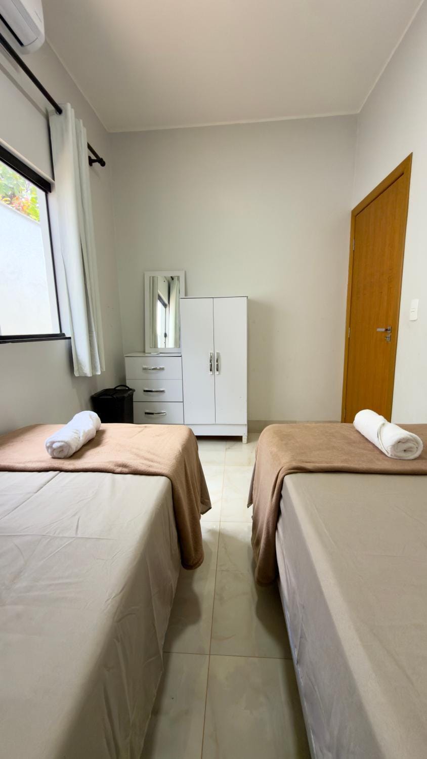 Bedroom, towels, wardrobe, air conditioner