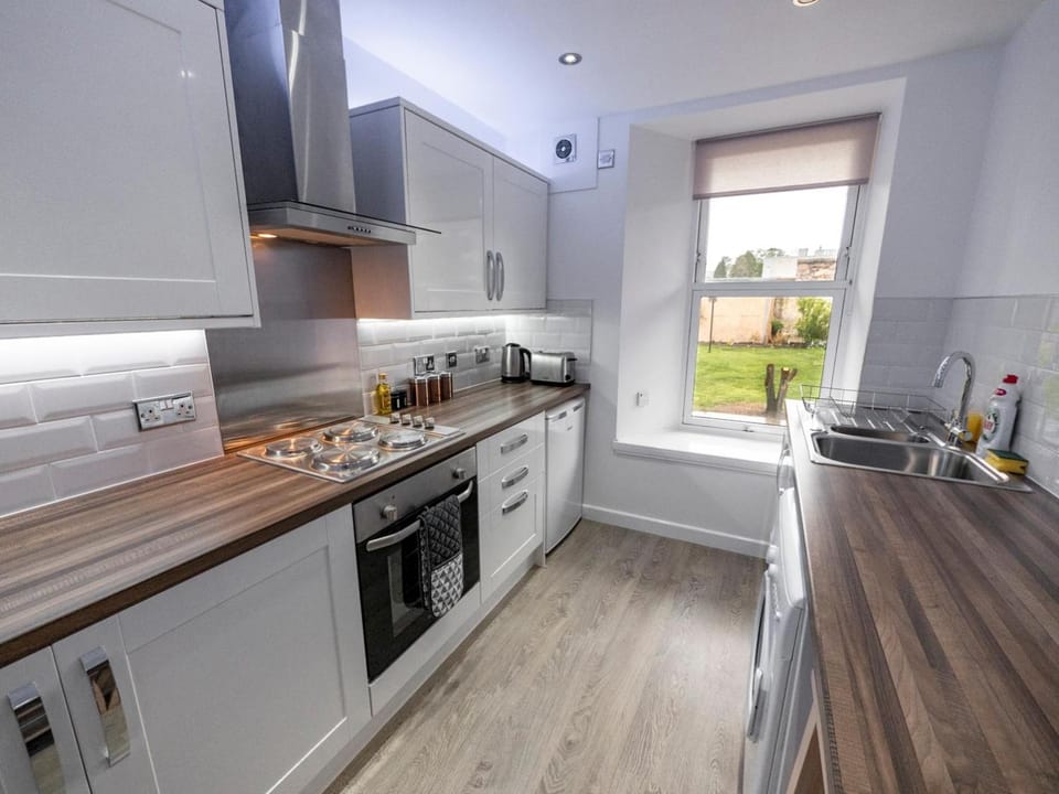 Kitchen or kitchenette, microwave, oven, stove, kitchen