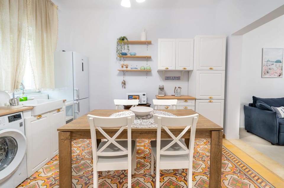 Dining area, oven, washing machine, kitchen