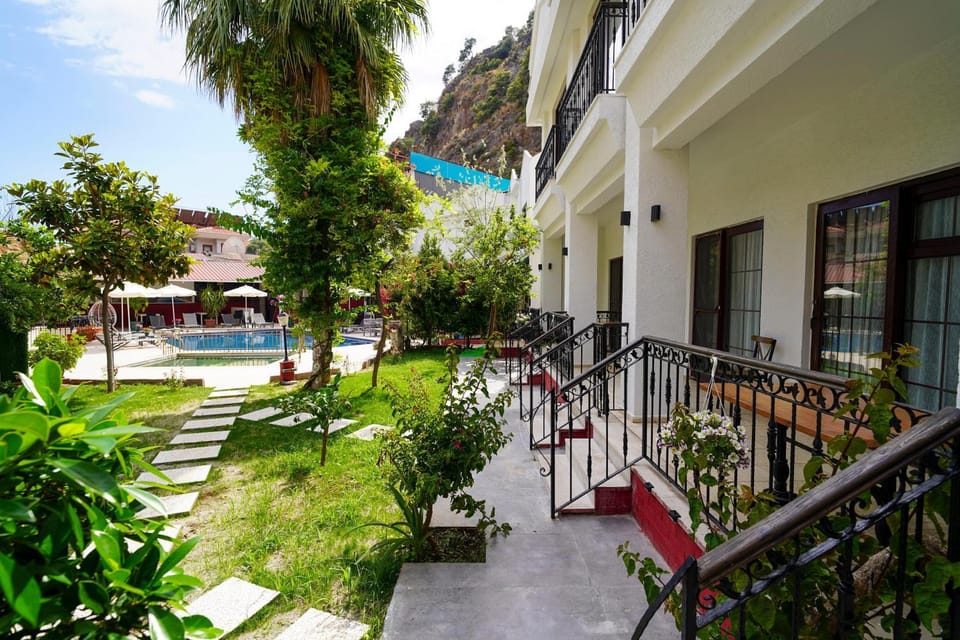 Property building, Patio, Day, Garden, Garden, View (from property/room), Balcony/Terrace, Balcony/Terrace, Garden view, Pool view, Swimming pool