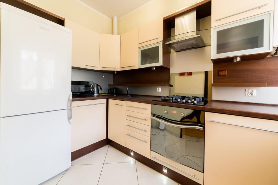 Kitchen or kitchenette, dishwasher, oven, stove