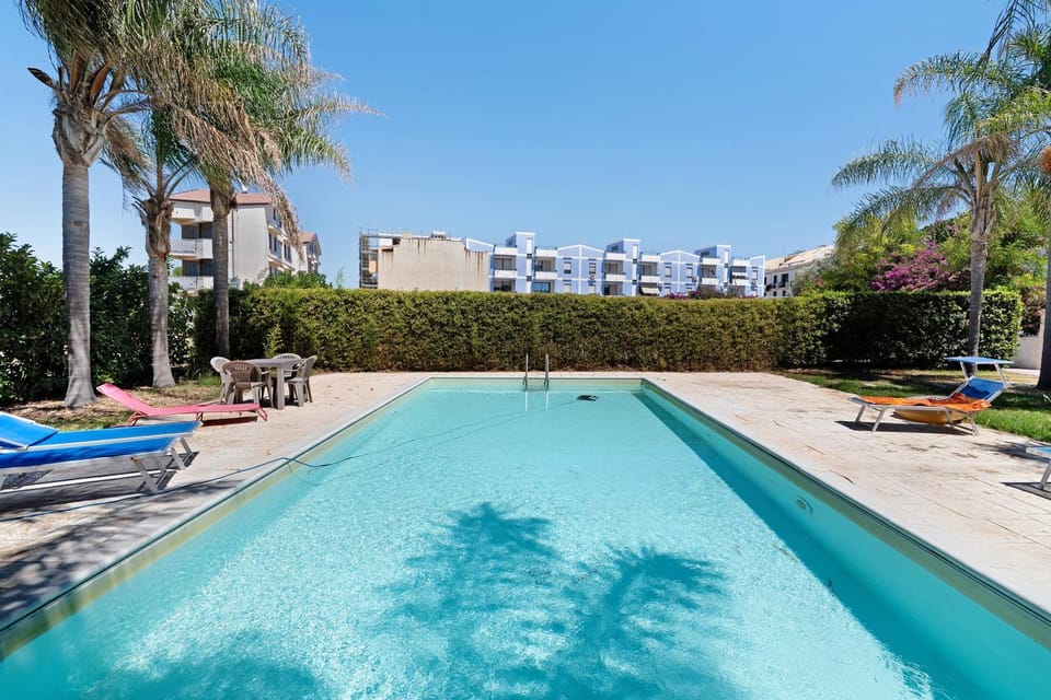 Property building, Living room, Swimming pool