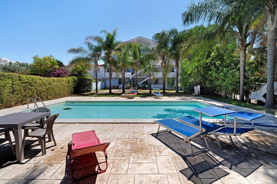 Property building, Living room, Swimming pool