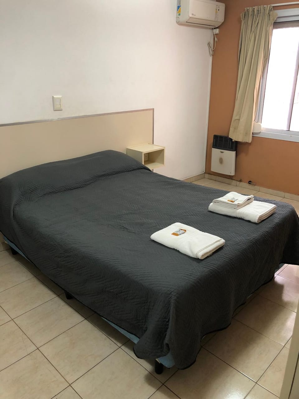 Bed, Photo of the whole room, Bedroom, towels, air conditioner