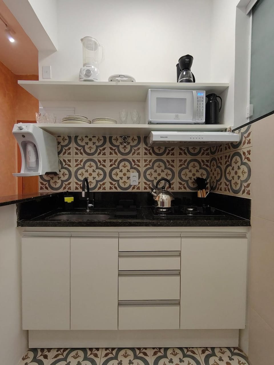 Kitchen or kitchenette, microwave