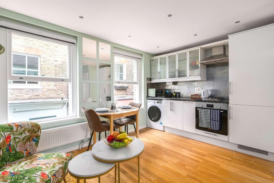 Kitchen or kitchenette, Living room, Seating area, Dining area, Quiet street view, oven, stove, toaster, washing machine