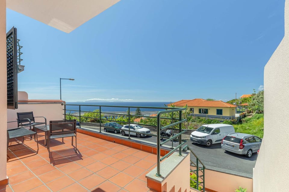 Property building, Patio, Day, Natural landscape, View (from property/room), Balcony/Terrace, Sea view, Parking