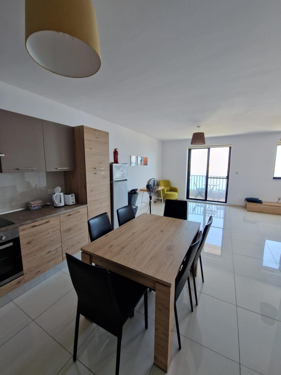 Coffee/tea facilities, Kitchen or kitchenette, Living room, Seating area, Dining area, Sea view, stove, toaster