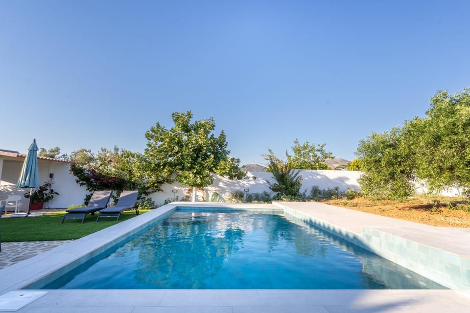 Property building, Living room, Swimming pool