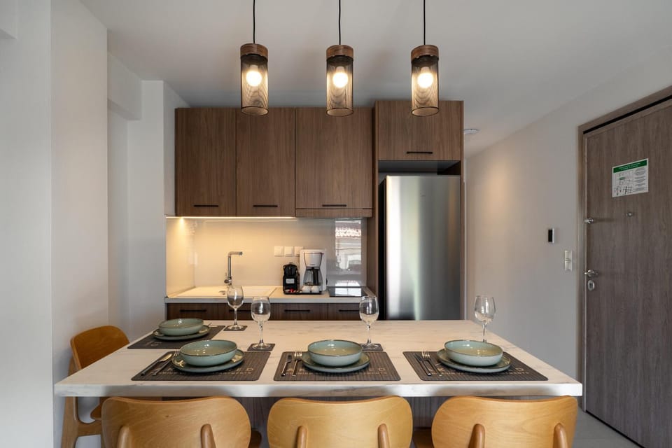 TV and multimedia, Coffee/tea facilities, Kitchen or kitchenette, Living room, Seating area, Dining area, oven, stove, wardrobe, kitchen, air conditioner