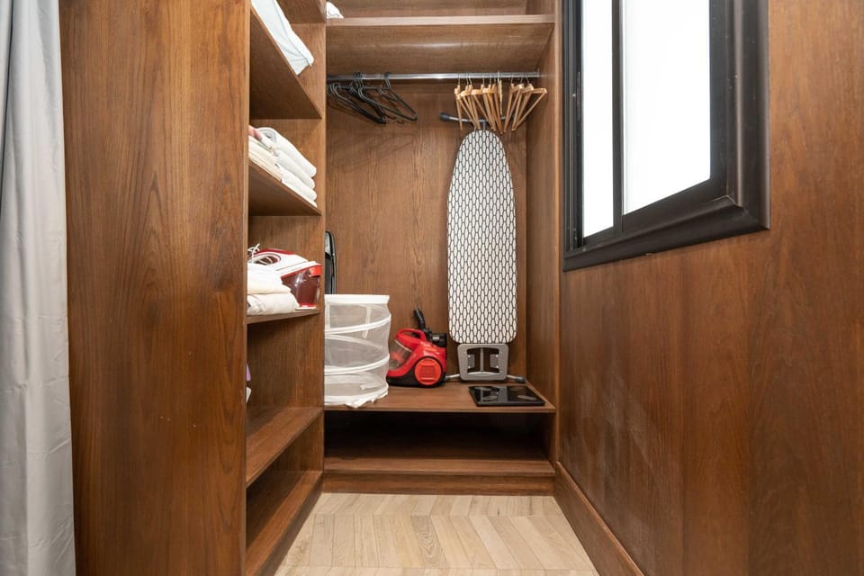 flat iron, storage, towels, wardrobe, air conditioner