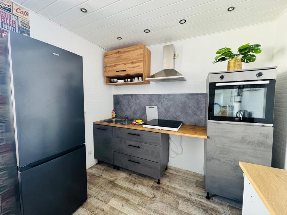 Kitchen or kitchenette, stove, kitchen