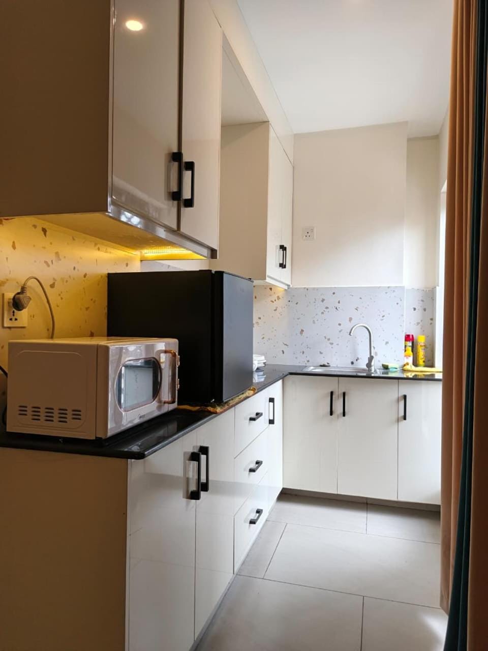 Kitchen or kitchenette, microwave