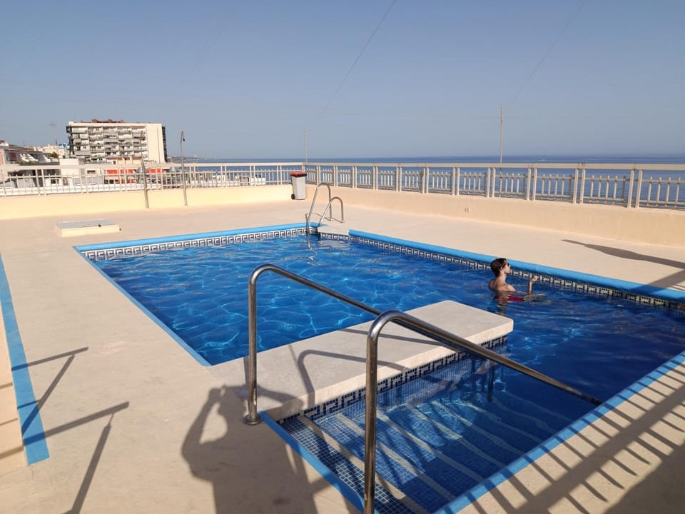 Landmark view, Pool view, Street view, Swimming pool