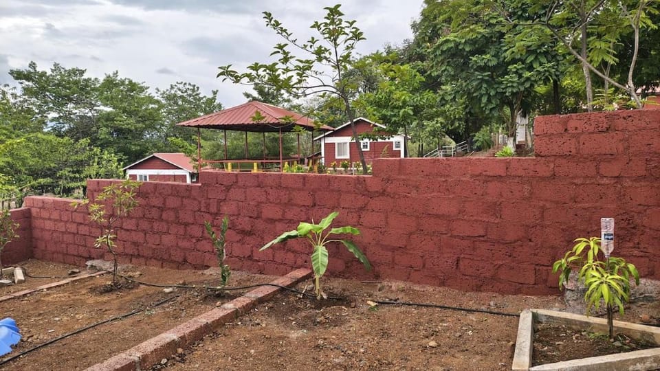 The Rustic Red Cottage Gold Valley Konkan at Vile House in Maharashtra