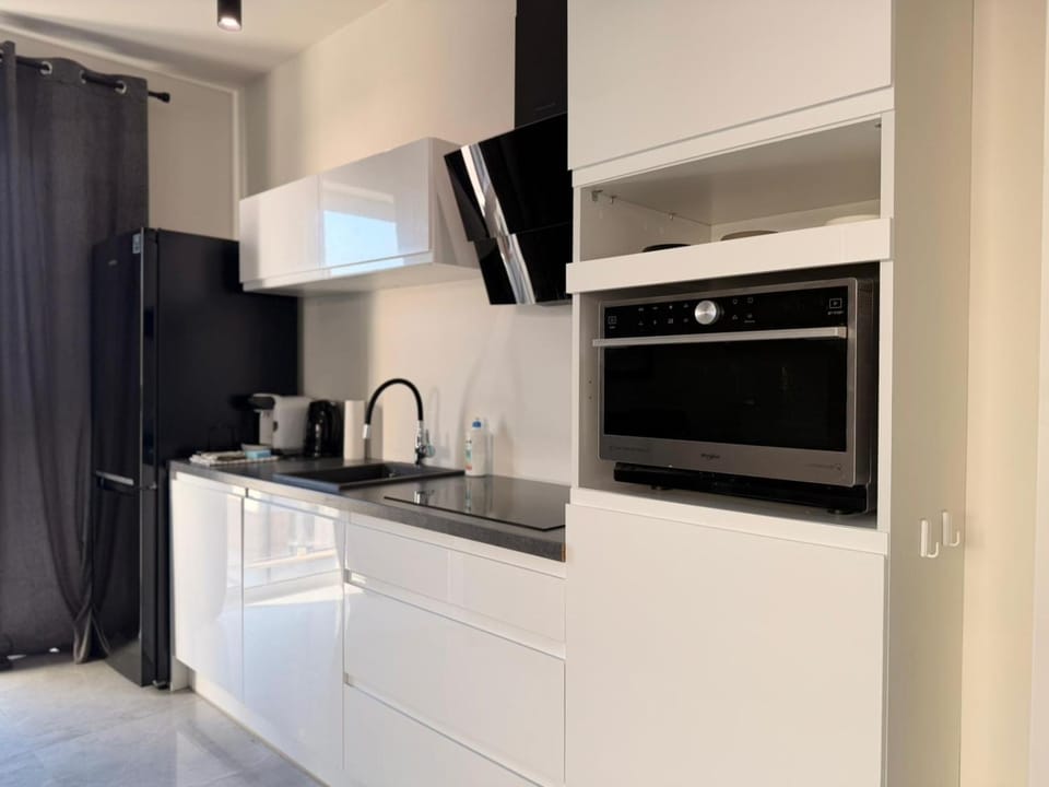 Kitchen or kitchenette, microwave, oven, stove, stove, kitchen, kitchen