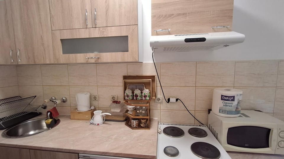 Kitchen or kitchenette, stove, kitchen