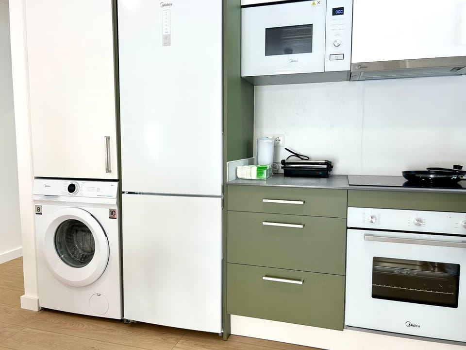 microwave, oven, stove, washing machine, kitchen