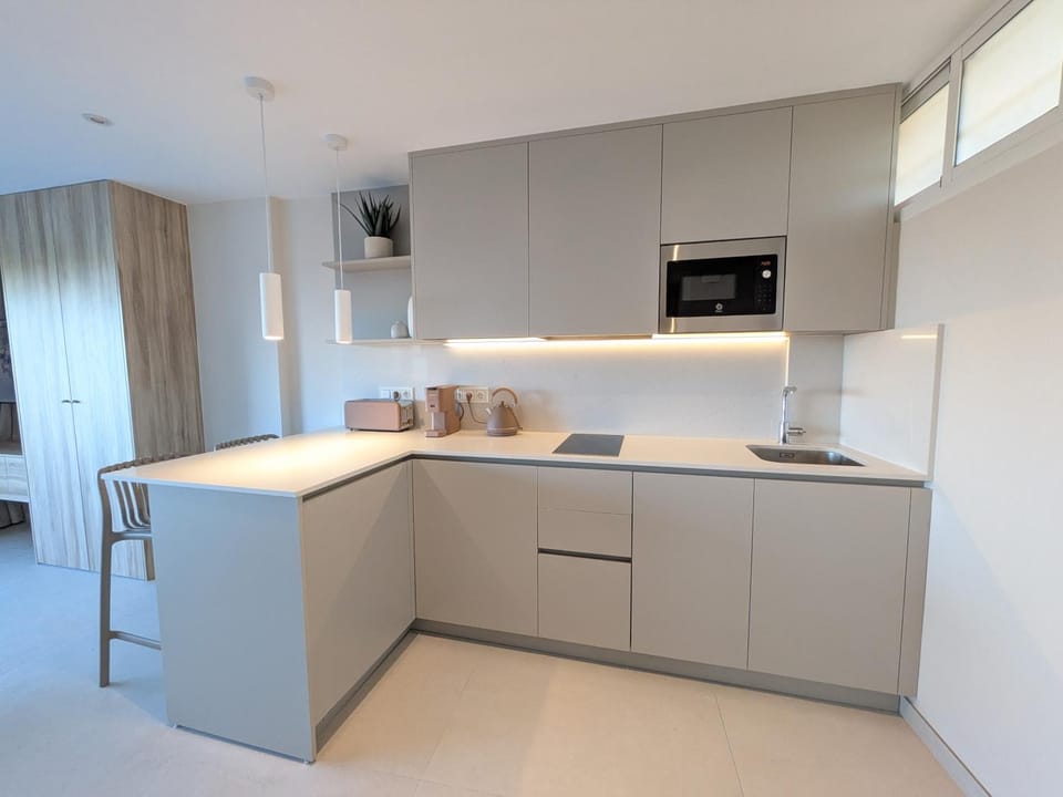 Kitchen or kitchenette, stove