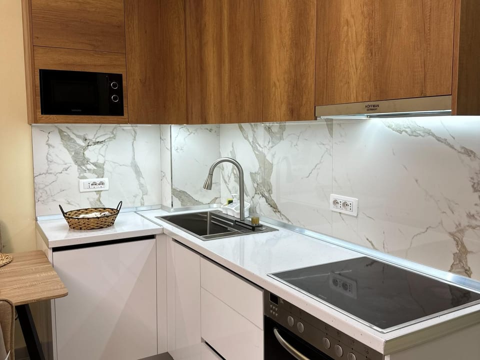 Kitchen or kitchenette, oven, stove