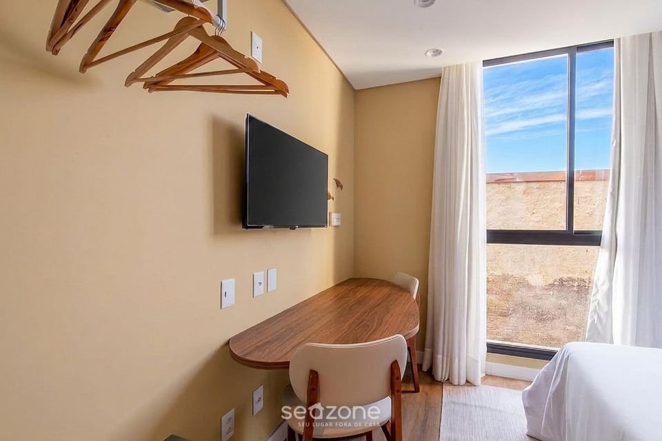 Bed, TV and multimedia, View (from property/room), Seating area, Bedroom