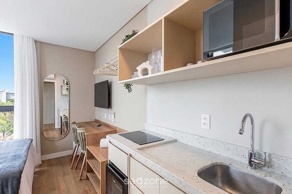 TV and multimedia, View (from property/room), Kitchen or kitchenette, Seating area, Bedroom