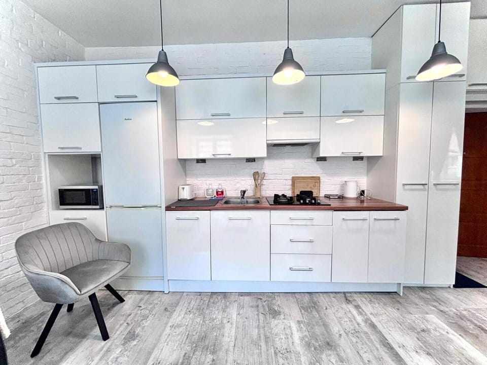 Kitchen or kitchenette, stove