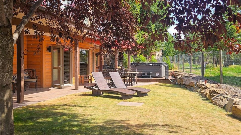 Log Style Home with Hot Tub by StayIn Apartment in Radium Hot Springs